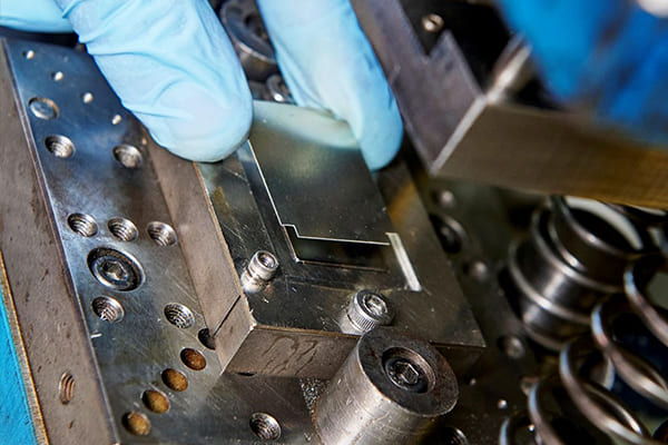 stamping press waste reduction strategies